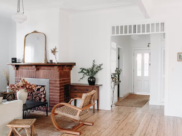 the living room interior with a fireplace at The Settler, Dubbo