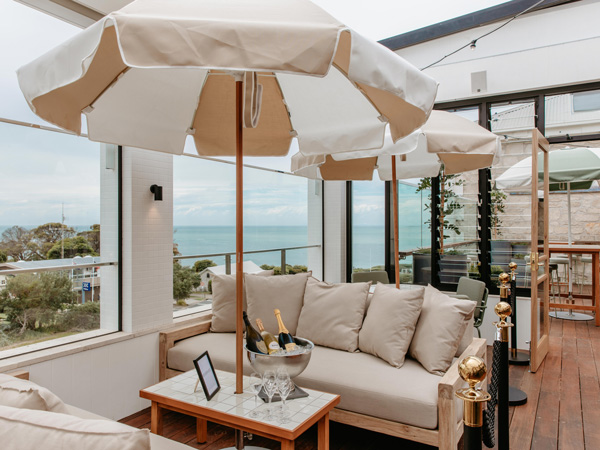 rooftop seating under huge umbrellas at Hotel Sorrento, Vic