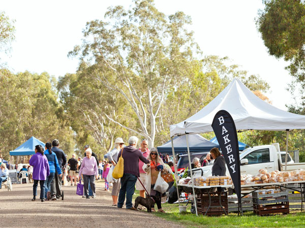 people shopping at the stalls along Avoca Riverside Market, Ballarat