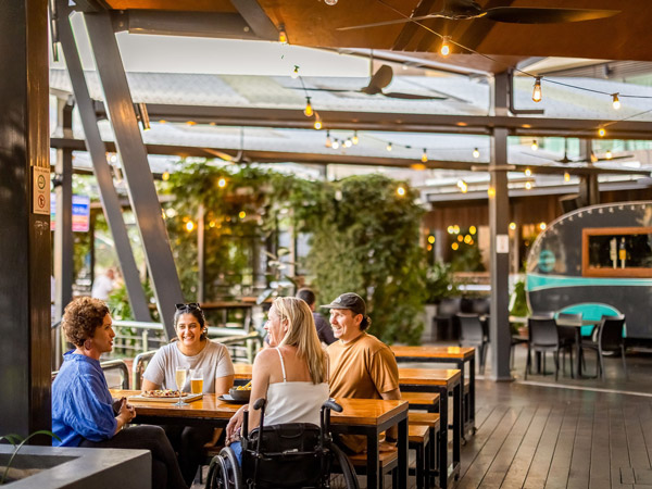 friends dining in a pub at The Precinct Tavern, Darwin