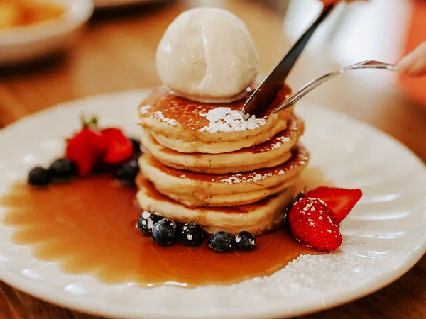 a close-up shot of pancakes at Short Street Store, Dubbo