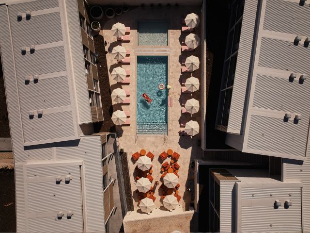 The swimming pool and modern wing of The Lodge Wadjemup