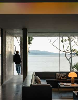 Guest at Vipp Tunnel on Bruny Island looks out at the view