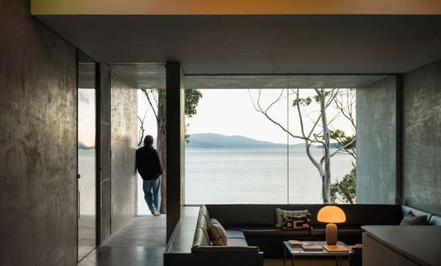 Guest at Vipp Tunnel on Bruny Island looks out at the view