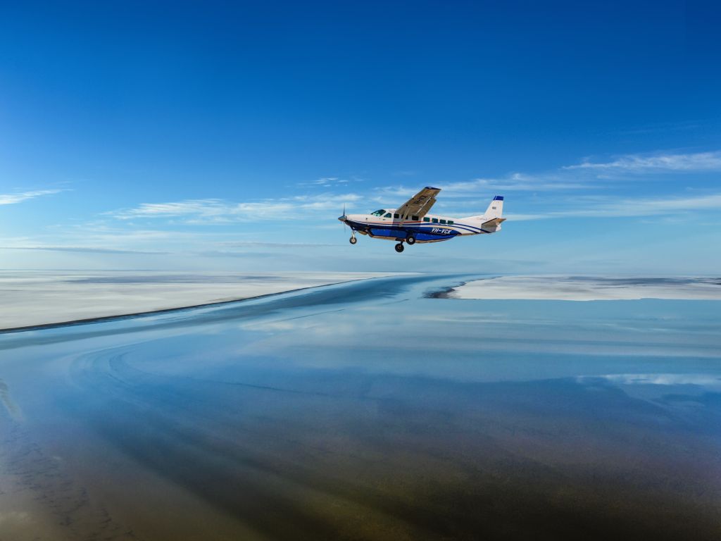 Outback Spirit Cessna plane flying over Kati Thanda-Lake Eyre