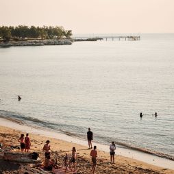 people swimming in Nightcliff Beach, Darwin