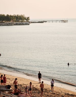 people swimming in Nightcliff Beach, Darwin