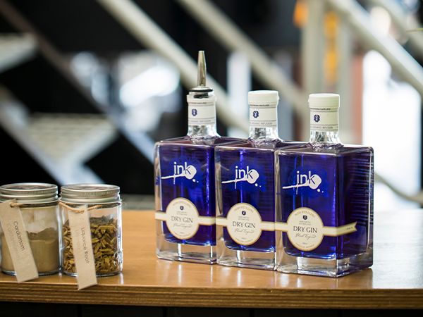 Three bottles of ink gin.