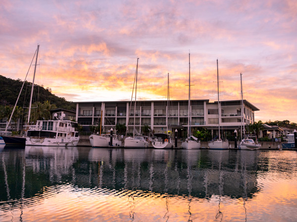 boats docked at Peppers Blue on Blue Resort Magnetic Island at sunset