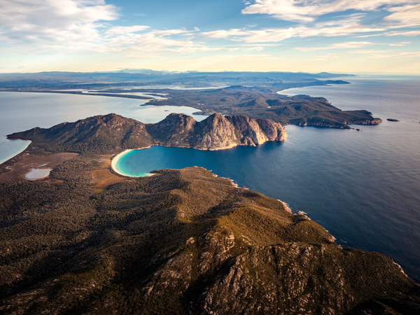 a scenic view of Wineglass Bay, Freycinet Peninsula