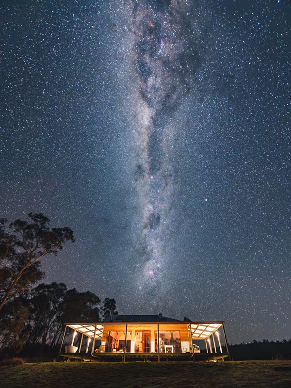 Kestrel Nest EcoHut at night with Milky Way above