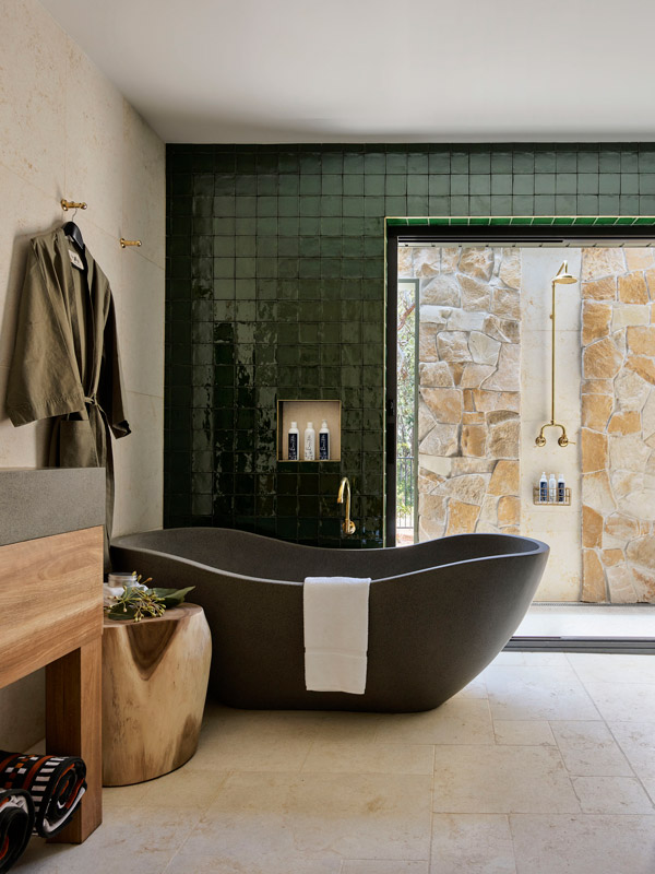 a bathroom with a private tub at The Lodges at Bells at Killcare