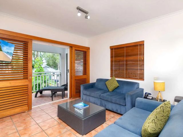 Paradise on the Beach Resort living room with private balcony