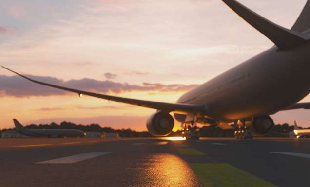 plane about to take off at sunset
