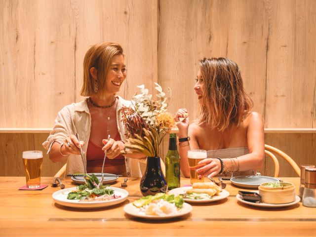 two women dining at Paper Crane by Crystalbrook