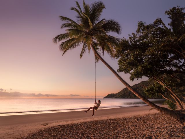 sunset swing at Cow Bay Beach
