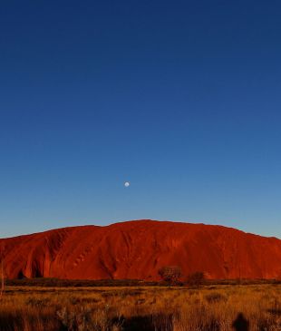 <p>A solar eclipse will be visible above <strong>Uluṟu</strong> – <i>how to time your trip</i></p>
