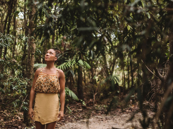 Woman in nature on a Winter Wellness Retreat with Elements of Byron