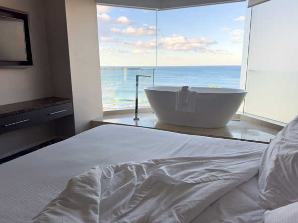 Panorama suite bath and bedroom at Novotel Wollongong Northbeach