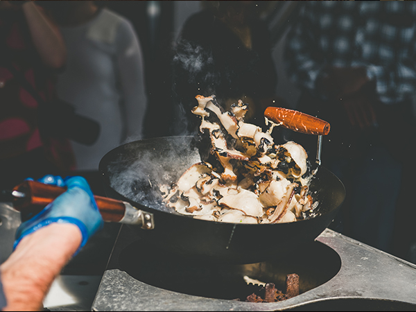 Tasmanian abalone being cooked in a pan.