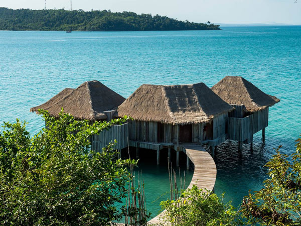 Overwater bungalows in Cambodia's Song Saa Private Island Resort 