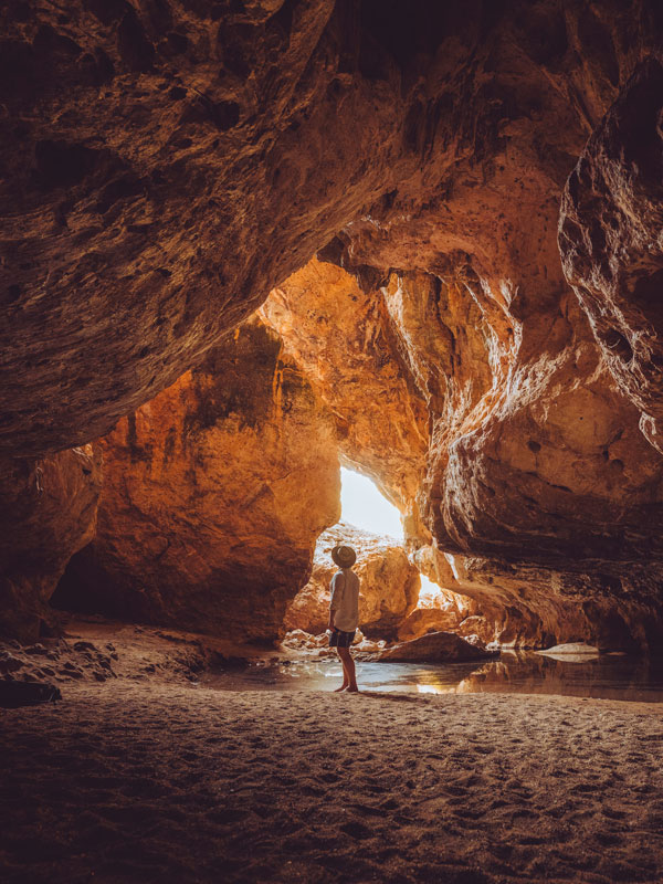 a person visitingTunnel Creek on a Gibb River Road trip