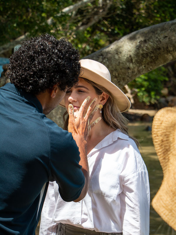 a man touching a woman's face, Jellurgal Aboriginal Cultural Centre
