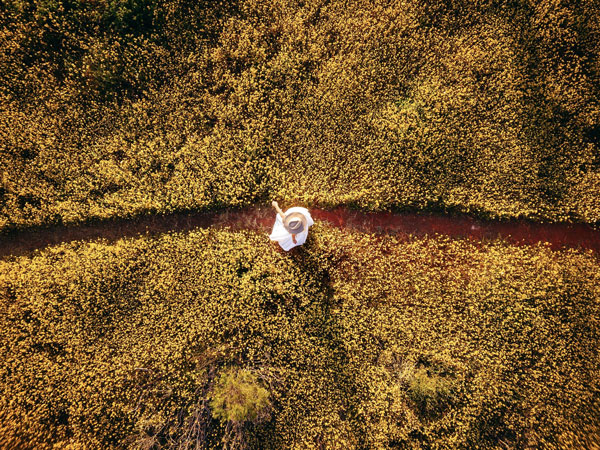 a woman walking along Coalseam Conservation Park