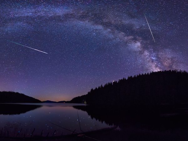 Long time exposure night landscape with Milky Way Galaxy during the Delta Aquariids meteor shower