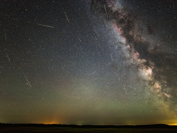 Night sky with stars and milky way during the Delta Aquariids meteor shower