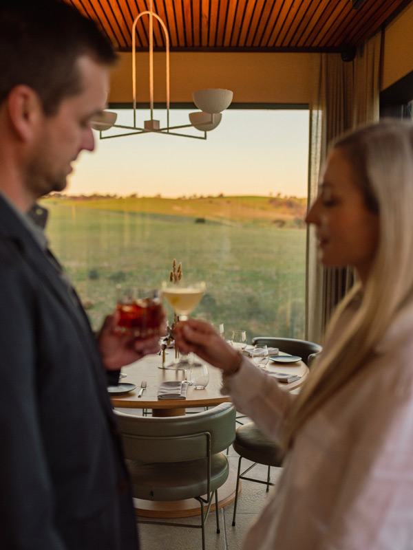 a couple having a drink at Kingsford The Barossa