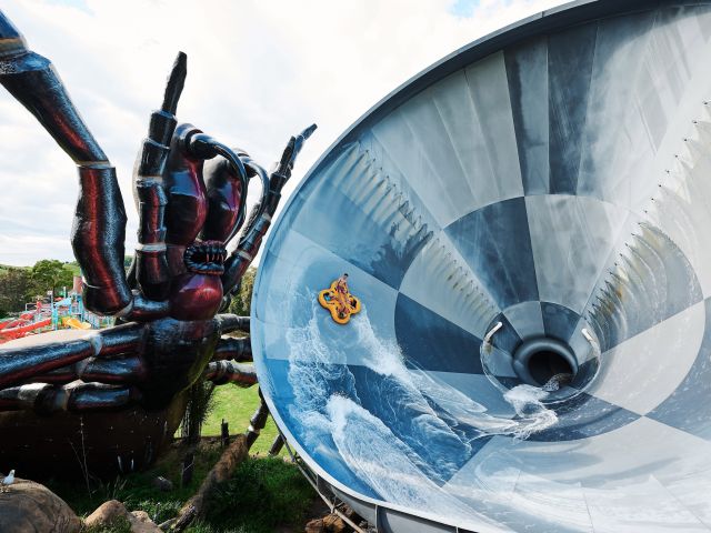 a huge spider sculpture at the Funnel Web thrill ride, Jamberoo Action Park