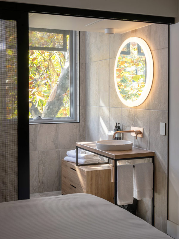 bathroom with a sink and a mirror at Zagame’s House, Melbourne accommodation