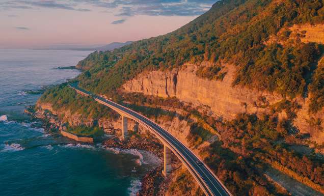 The scenic coastal drive along Sea Cliff Bridge, Clifton.