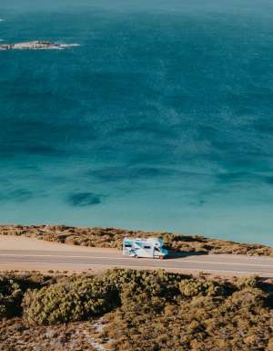 Aerial view of the Star RV Motorhomes Polaris 6 vehicle cruising along a coastal road in Esperence western australia