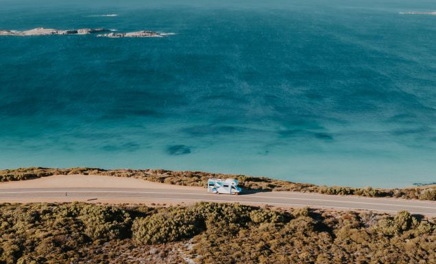 Aerial view of the Star RV Motorhomes Polaris 6 vehicle cruising along a coastal road in Esperence western australia