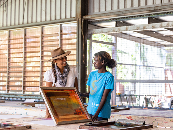 A creative moment shared inside Tiwi Design’s screen-printing space.