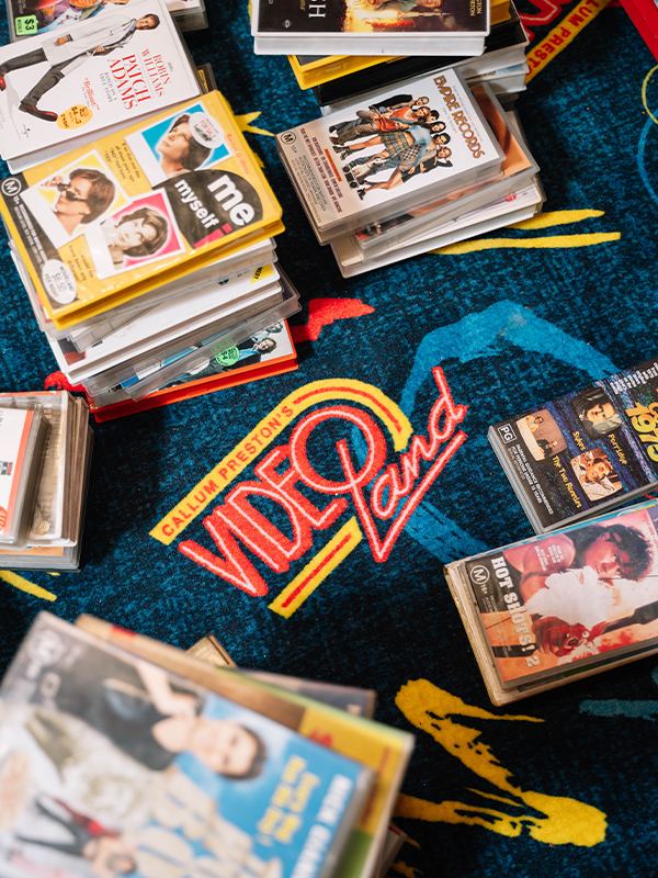 Videos spread across a colourful carpet