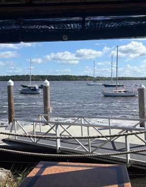View of the water from inside Chez Basho Boatshed Cafe in Iluka