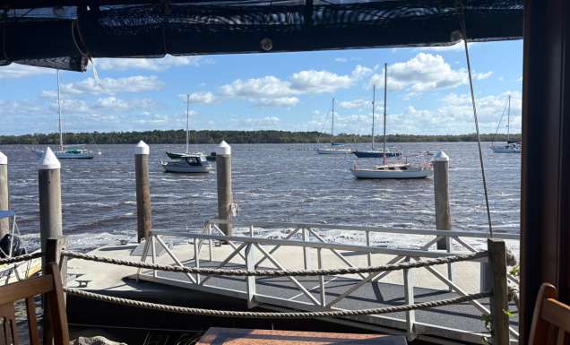View of the water from inside Chez Basho Boatshed Cafe in Iluka