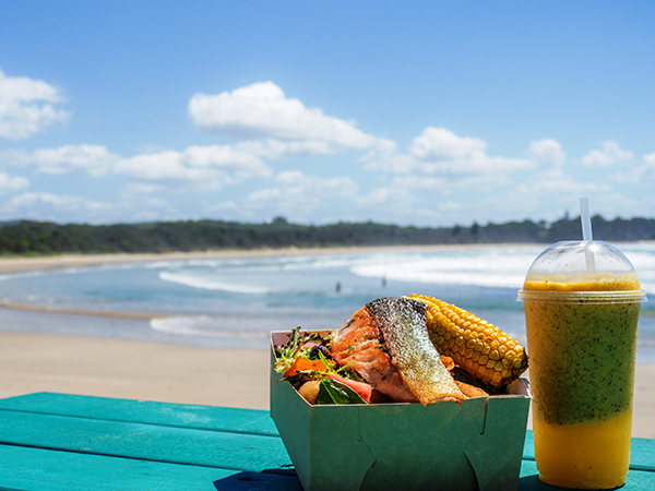 Freshly caught seafood by the beach, with sparkling ocean views.