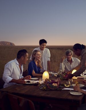 A table of people dining at Tali Wiṟu in Uluṟu