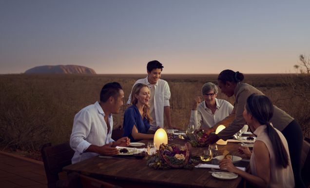 A table of people dining at Tali Wiṟu in Uluṟu