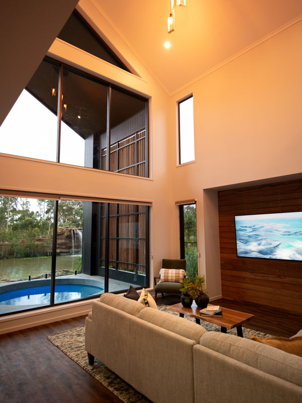 Interior lounge and deck area of Crocodile Cabins at Australia Zoo