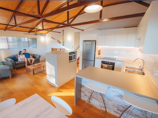 couple inside Kingfisher Bay Resort Villa