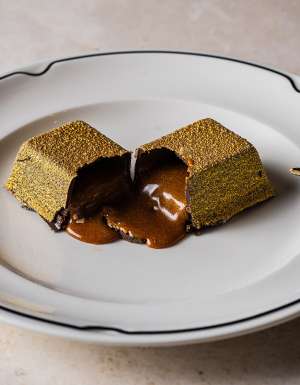 Luke's Golden Chocolate Bar dessert after it's been cut open at Luke's Kitchen Sydney