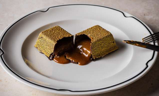 Luke's Golden Chocolate Bar dessert after it's been cut open at Luke's Kitchen Sydney