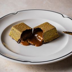 Luke's Golden Chocolate Bar dessert after it's been cut open at Luke's Kitchen Sydney