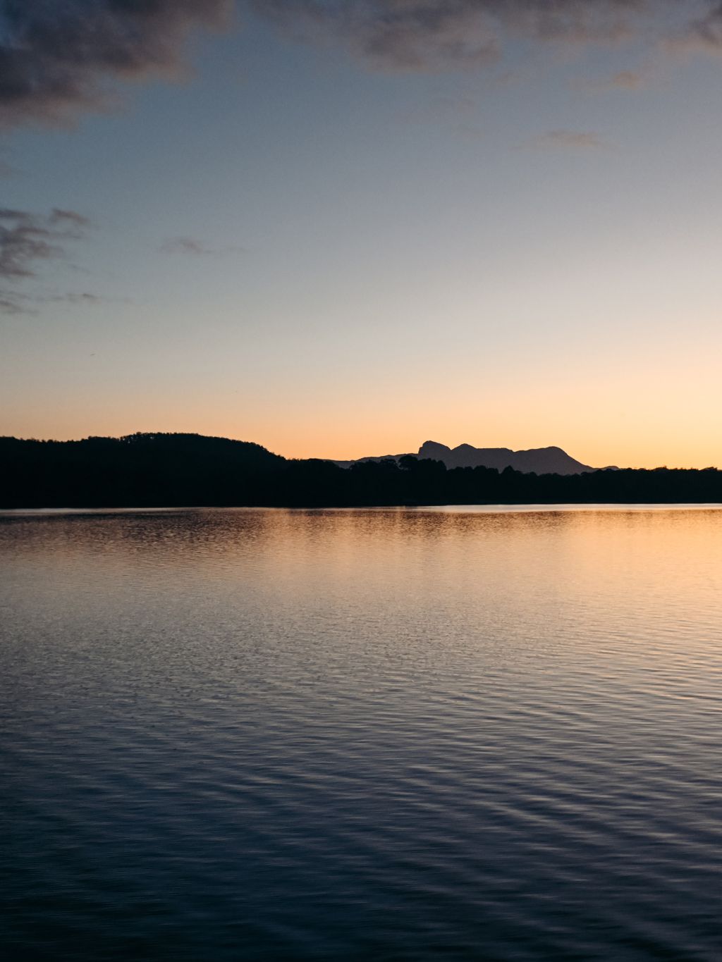 The sun sets over Lake St. Clair at Pumphouse Point