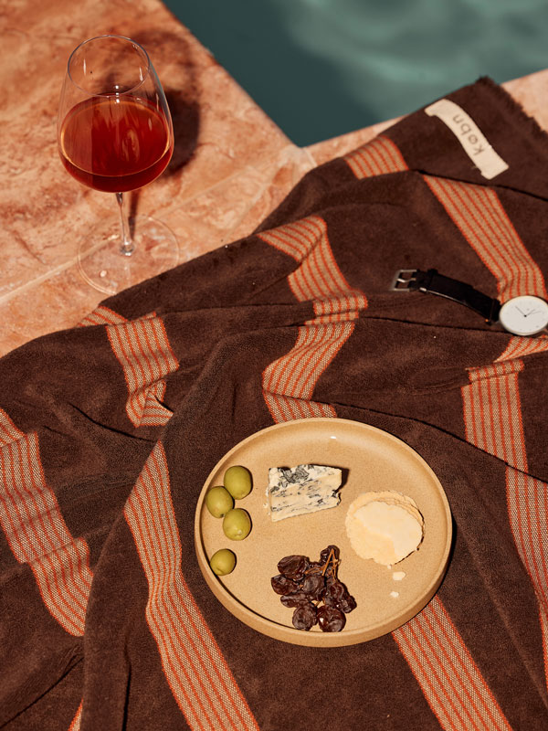 food and wine by the pool at Swell Hotel Byron Bay